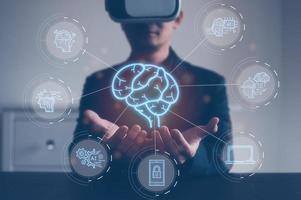 digital technology medical internet connection, man wearing VR glasses working with virtual icon brain ai icons, AI technology medical health tech. photo