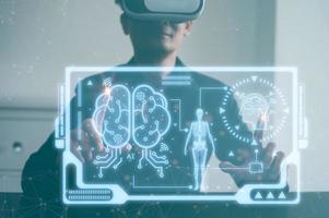 man wearing VR glasses working with virtual icon brain ai icons, AI technology medical health tech. photo