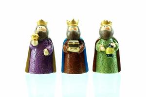 Close up Three Kings Isolated on White Background in Nativity Concept. photo