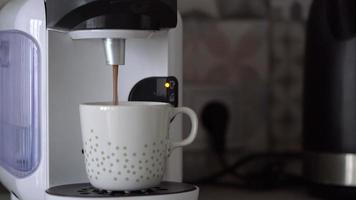 Home coffee machine prepares a cup of fresh coffee video