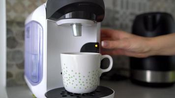 Home coffee machine prepares a cup of fresh coffee video