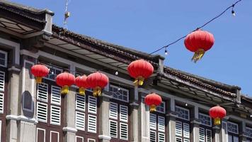 Row of red lantern decorate at outdoor of heritage house video