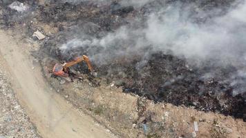 Eexcavator dig to avoid spread of fire video