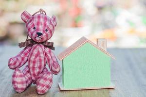 bear toy save money to buy a house photo