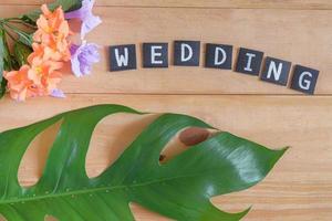Wedding text on wood table , love concept. photo