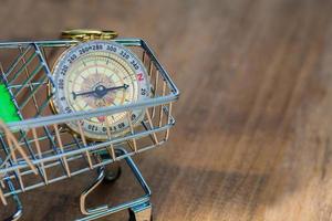 compass in shopping cart photo