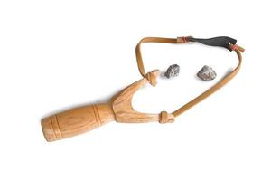 Homemade slingshot or catapult, playing tool for kid on white background. photo