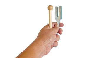 Tuning fork in sound therapy or  tunning musical instruments . photo