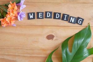 Wedding text on wood table , love concept. photo