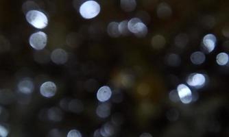 Blurred garden trees on nature background, blurred green bokeh light outdoors on summer background. Big tree. photo