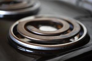 Electric tile in the kitchen. The spiral of the electric stove. photo