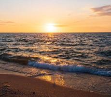 Panorama viewpoint landscape travel summer sea wind wave cool on holiday calm coastal big sun set sky light orange golden Nature tropical Beautiful evening hourday At Bang san Beach Chonburi Thailand. photo