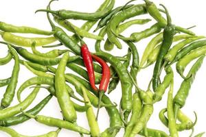 Green chili pepper isolated on white photo