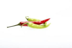 Green chili pepper isolated on white photo