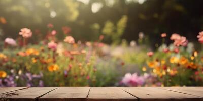 Empty wooden table in flowers garden blurred background, Free space for product display. photo