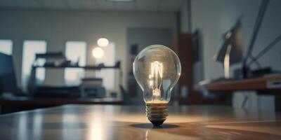 Business ideas concept with glowing light bulb in workplace. photo