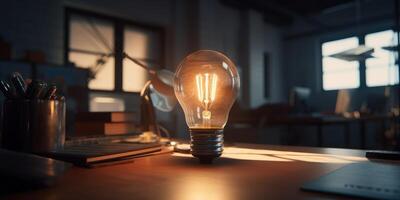 Business ideas concept with glowing light bulb in workplace. photo