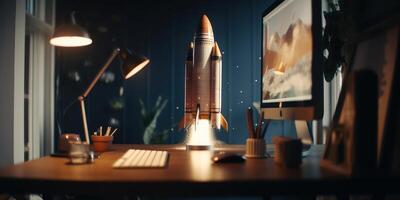 Business start up concept with rocket launching in workplace. photo