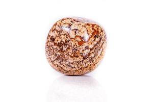 Macro mineral rock jasper landscape sandy on white background photo