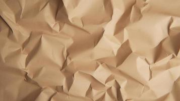 close up of crumpled brown paper texture background with copy space photo