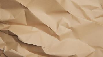 close up of crumpled brown paper texture background with copy space photo