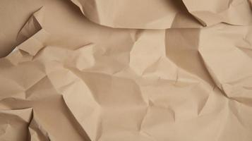 close up of crumpled brown paper texture background with copy space photo