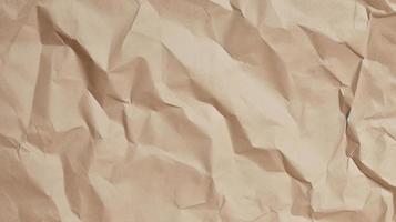 close up of crumpled brown paper texture background with copy space photo