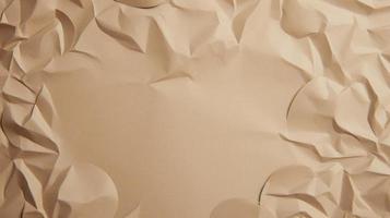 close up of crumpled brown paper texture background with copy space photo