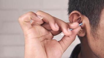 Close up of your man using cotton bar video