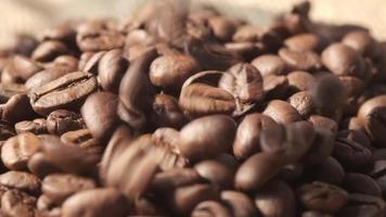 Close up of fresh coffee beans on black background video