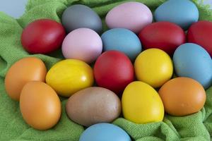 eggs painted in different colors to celebrate Easte photo