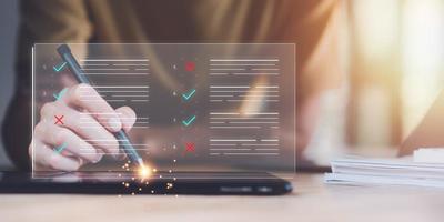 operator makes mark on the survey topic ,Checklist with checkmarks and checkboxes ,checklist ideas, online quality assessment ,checkbox to conduct opinion and quality surveys or satisfaction photo