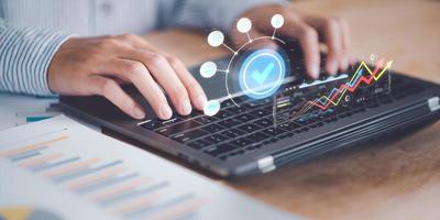 Businessman reading graph report and business statistics charts ,Analysis and improvement of corporate strategy ,Statistics and Data Concepts ,update annual budget accounts ,business growth graph photo