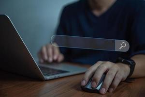 search ChatGPT chatting artificial intelligence chatbot. OpenAI Digital chatbot, chatGPT, robot Data Search Technology, Search Engine Optimization. Man using laptop computer photo