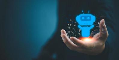 Businessman holding a light chatbot hologram intelligence AI. Digital chatbot, chatGPT, robot application.Chat GPT chat with AI Artifice intelligent developers digital technology concept photo