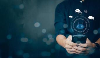 businessman using smart phone chatting with a smart AI or artificial intelligence. Digital technology robot information concept. photo