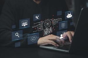 ChatGPT Chat with AI or Artificial Intelligence. Digital chatbot, robot application, OpenAI generate. Futuristic technology, Man using laptop computer on virtual screen. photo