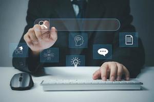 search ChatGPT chatting artificial intelligence chatbot. OpenAI Digital chatbot, chatGPT, robot Data Search Technology, Search Engine Optimization. Man using laptop computer photo