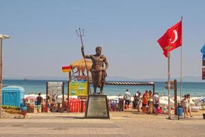 Altinkum beach in Didim, Turkey on a warm summer holiday day photo