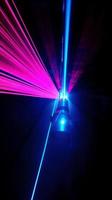 Colorful laser light glow in the dark room. Ai generated. photo