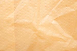 Orange plastic bag texture background photo