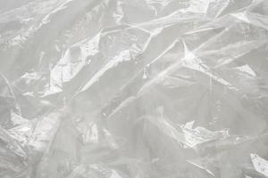 transparent plastic bag texture on white background photo