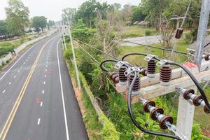 cable lines and electrical transmission on electric power pole photo