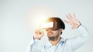 Businessman using virtual reality headset or 3d glasses on white background photo