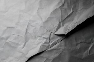 Design space grey crumpled paper textured background. photo