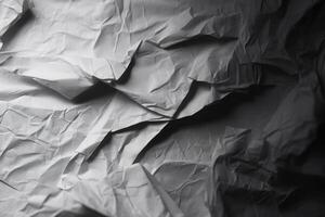 Design space grey crumpled paper textured background. photo