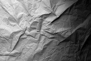 Design space grey crumpled paper textured background. photo