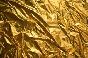 Design space gold crumpled foil paper textured background. photo