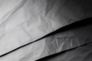 Design space grey crumpled paper textured background. photo