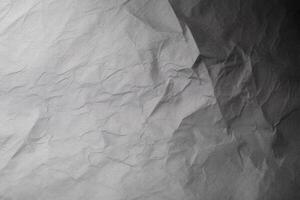 Design space grey crumpled paper textured background. photo